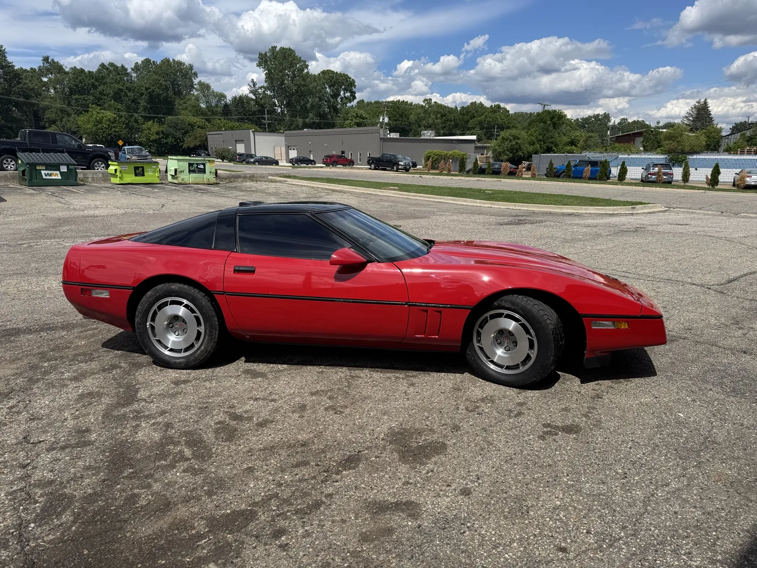 Red Chevrolet Corvette with professional window tint